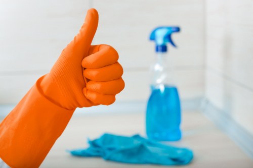 Staff reviewing safety procedures before a cleaning task