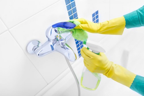 Local cleaner preparing a guest-ready flat in Battersea